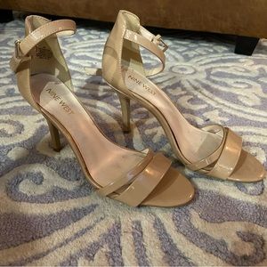 Nude paten leather pumps